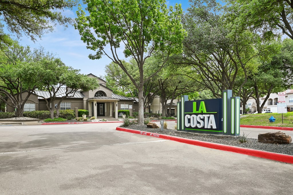 a building with a sign that says la costa