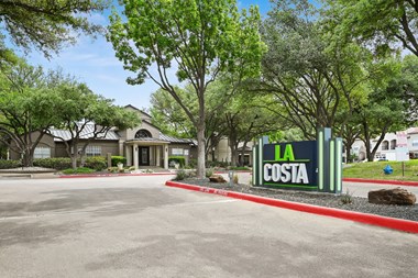 a building with a sign that says la costa