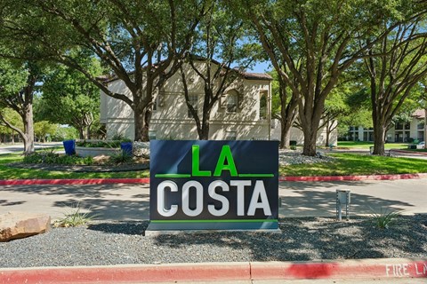 Property sign at La Costa in Plano, TX