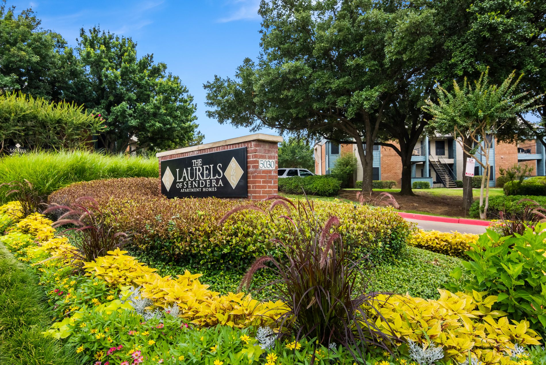 our apartments showcase a beautiful sign