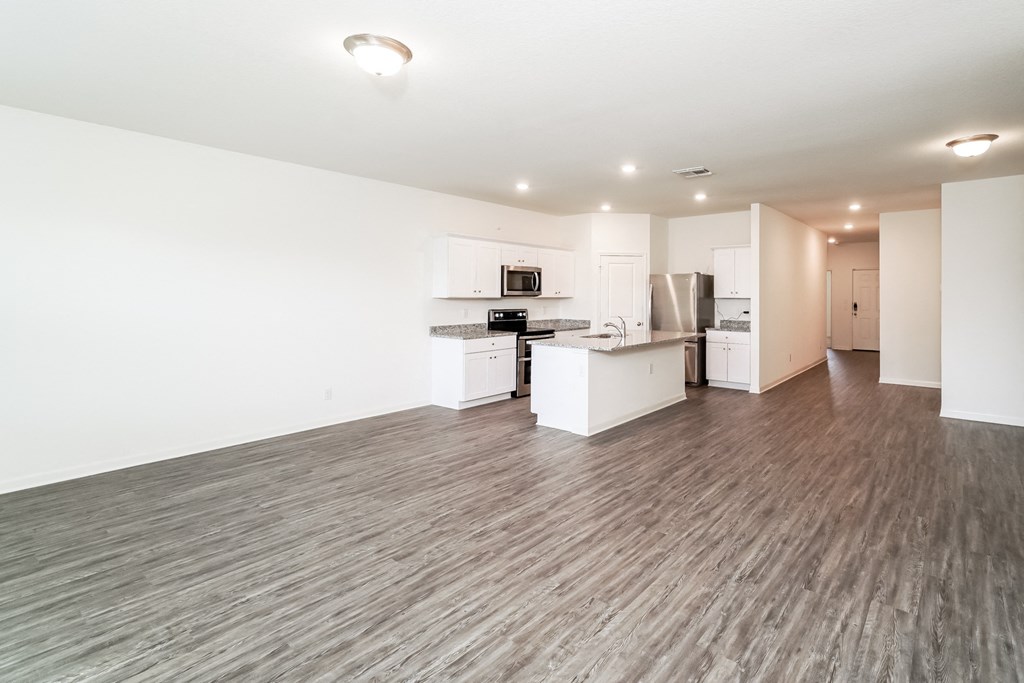 Magnolia living room and kitchen at Beacon at Ashley River Landing in Summerville, SC