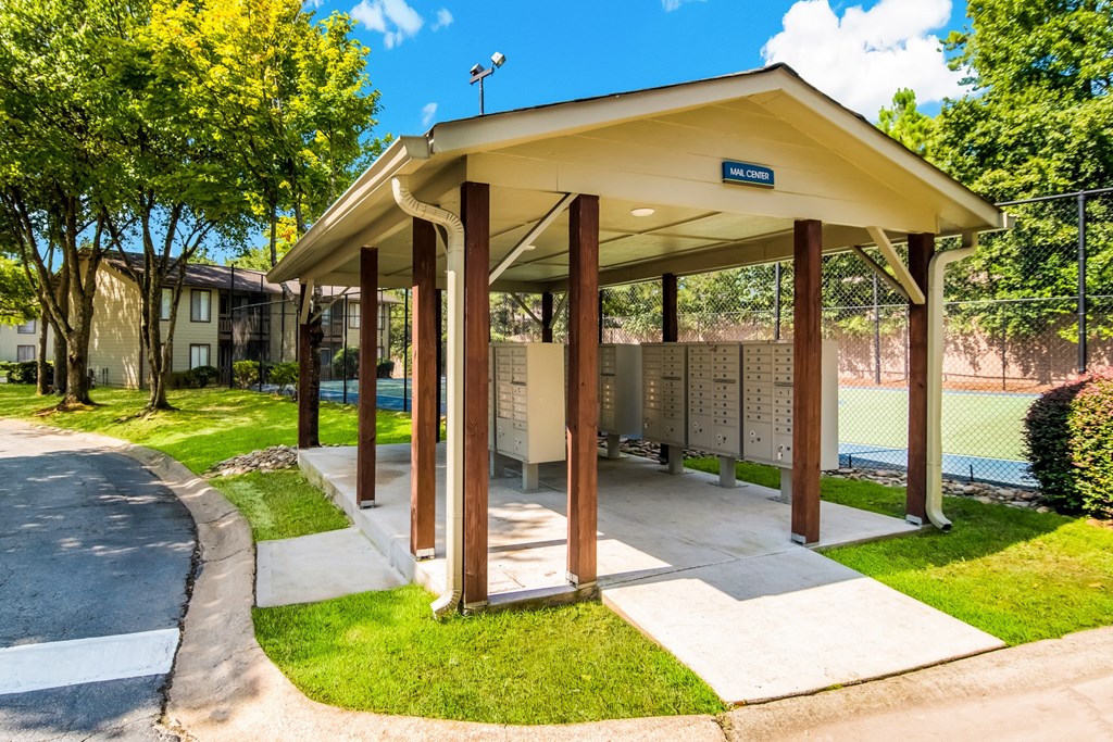 the pavilion at the tennis courts at the whispering winds apartments in pearland