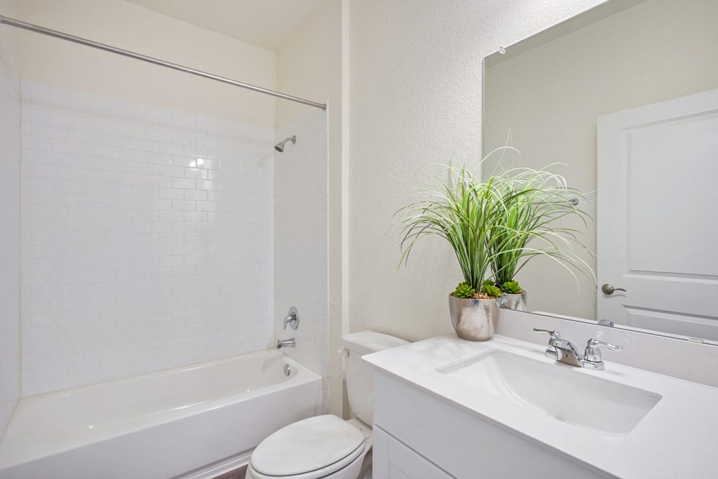 Maple model bathroom with plant and shower/bath tub at Beacon at Ashley River Landing in Summerville, SC