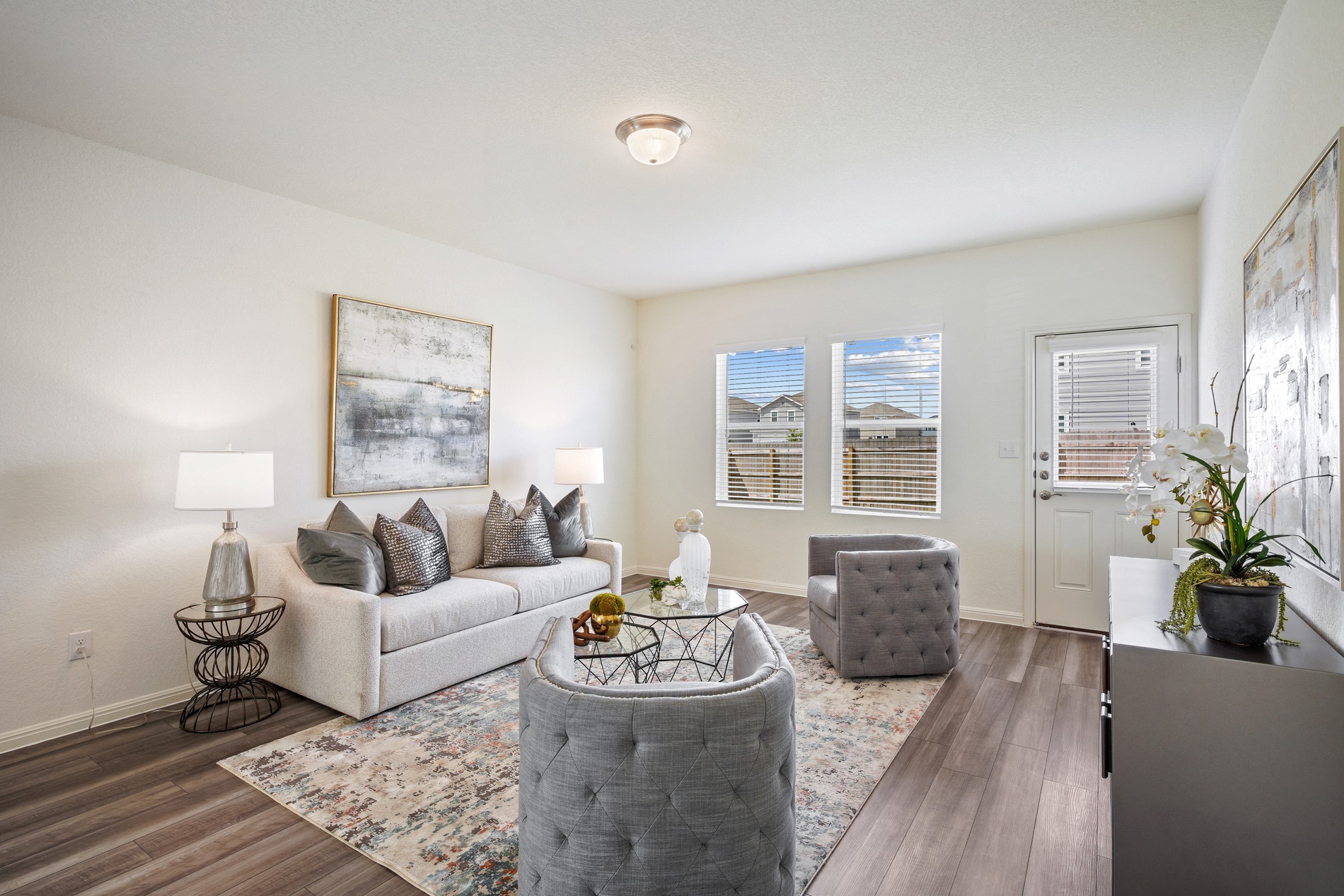 an open living room with a couch and a table