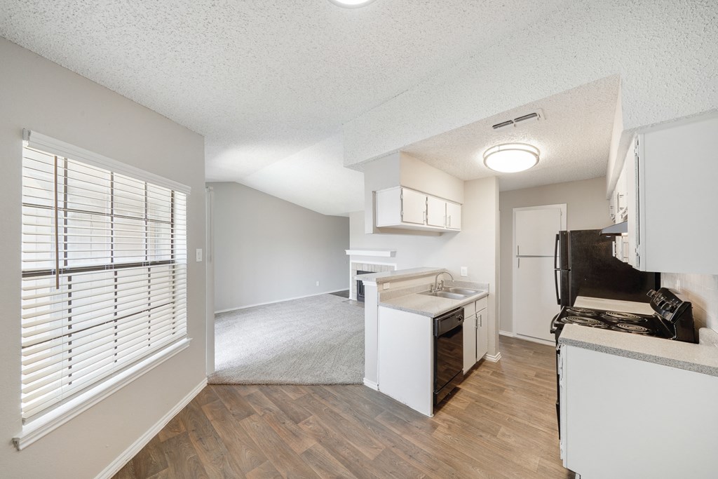 Kitchen and Dining Room at Polaris Apartment Homes in Irving, Texas, TX