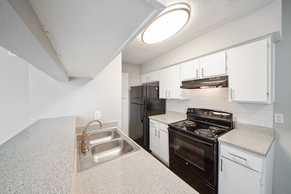 Unit Kitchen at Polaris Apartment Homes in Irving, Texas, TX