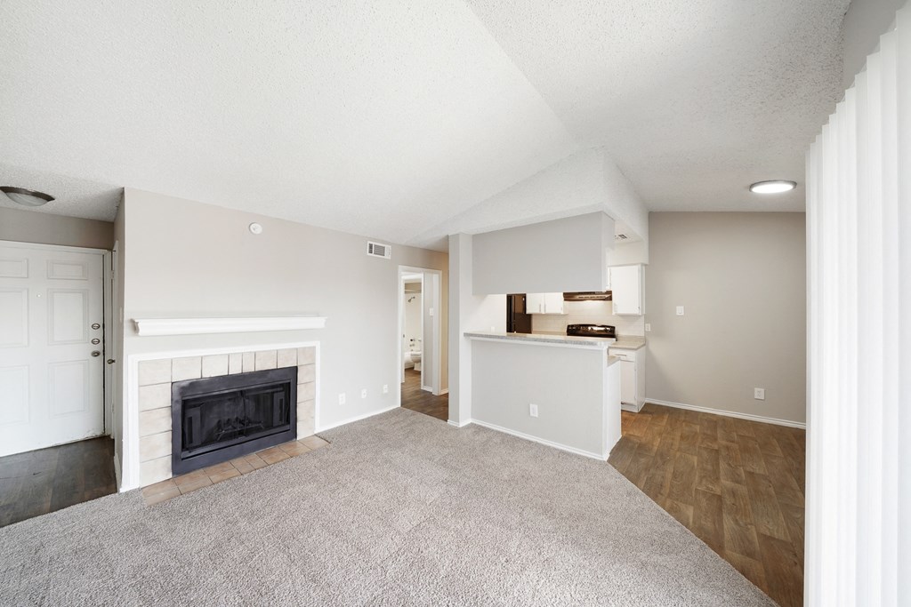 Living Room with Fireplace at Polaris Apartment Homes in Irving, Texas, TX