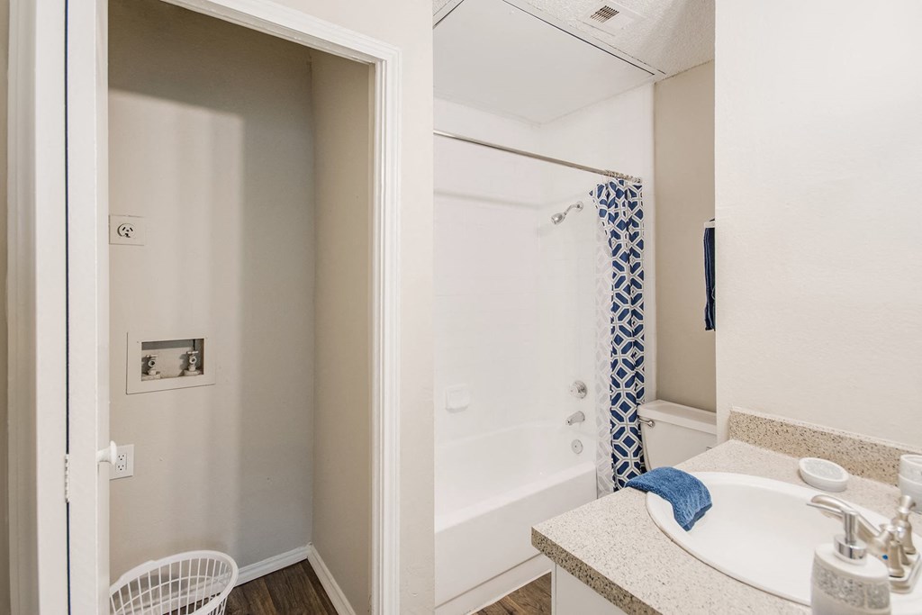 W/D Connections and Bathroom at Lakeridge Apartment Homes in Irving, Texas, TX