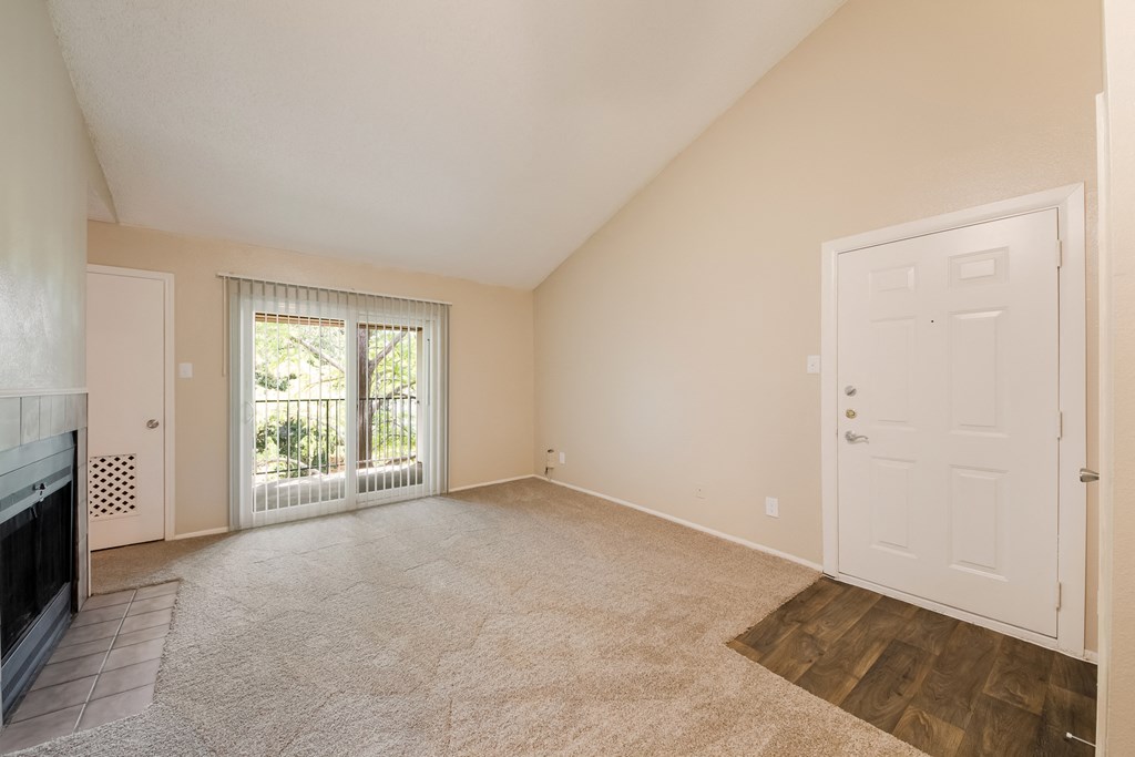 Model Living Room with Fireplace at Vista Crossing Apartments in San Antonio, TX