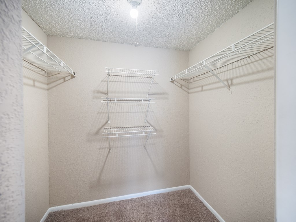Walk-In Closet at Reflections Apartment Homes in Gainesville, Florida, FL