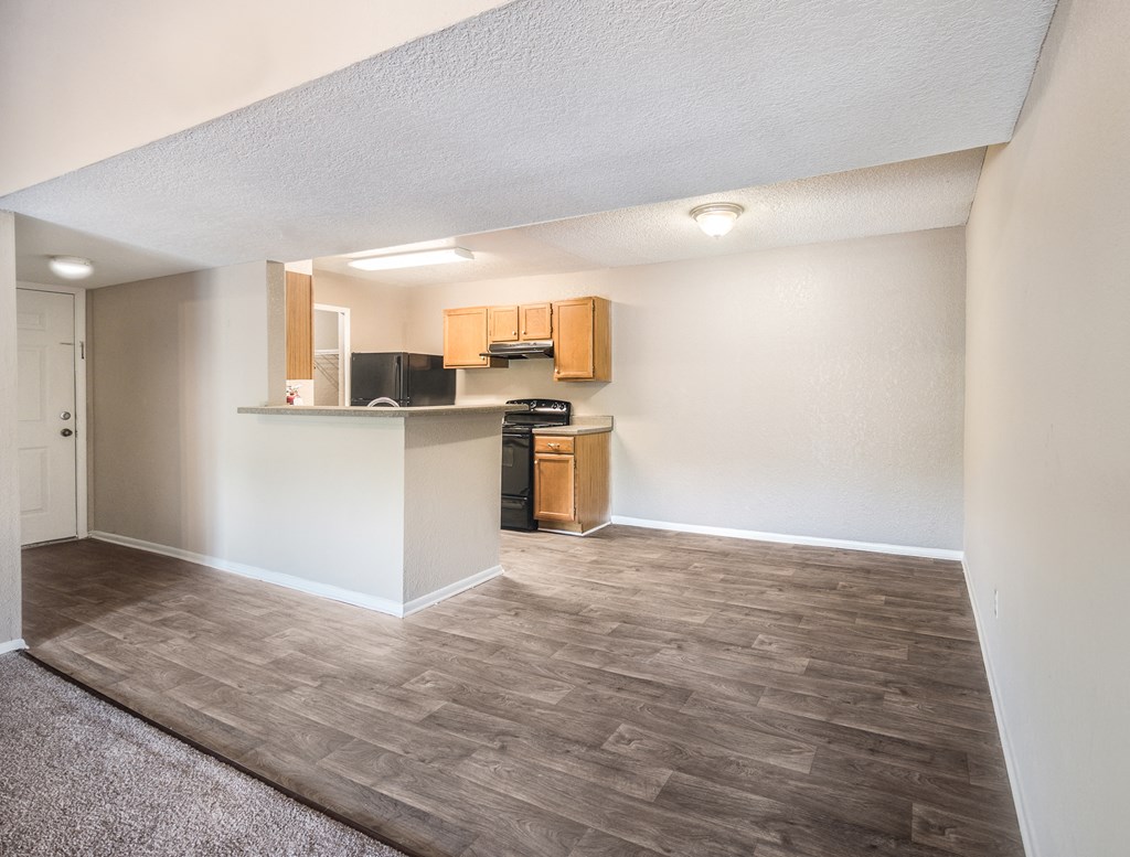 Model Kitchen and Dining Room at Reflections Apartment Homes in Gainesville, Florida, FL