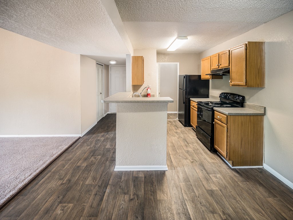 Model Kitchen at Reflections Apartment Homes in Gainesville, Florida, FL
