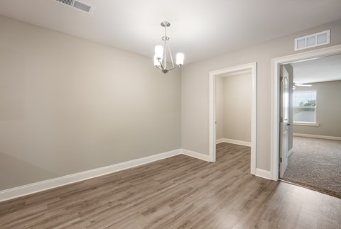 Model 3 Dining Room at Capital Grand Apartments in Tallahassee, FL
