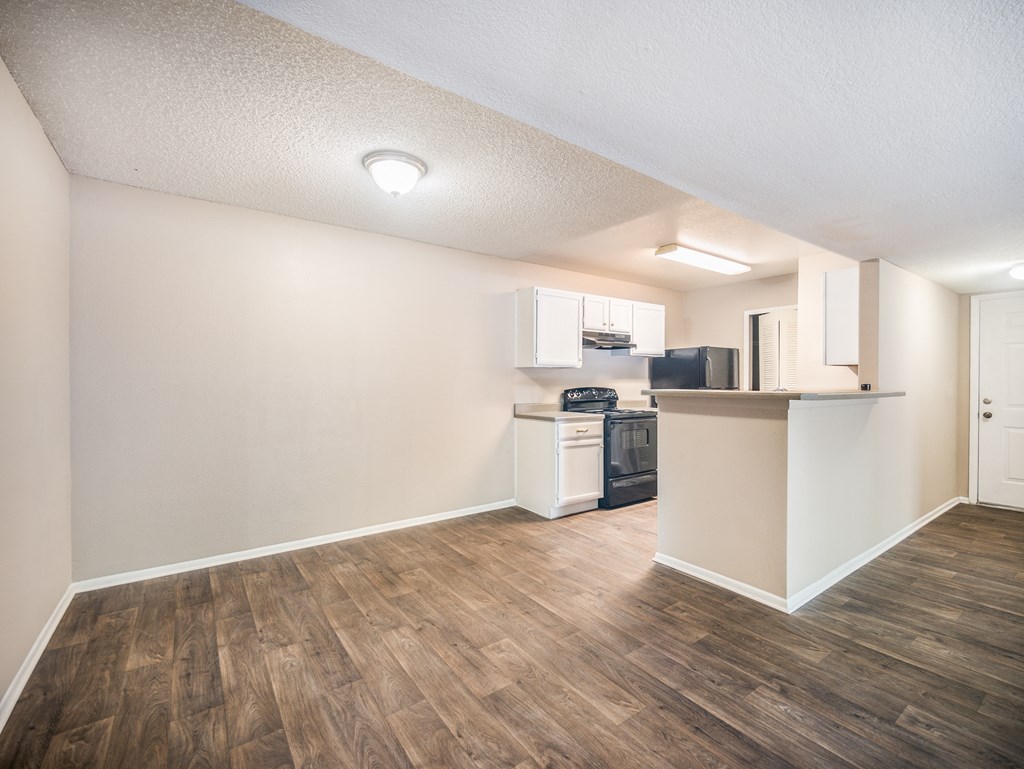 Model Kitchen and Dining Room at Reflections Apartment Homes in Gainesville, Florida, FL