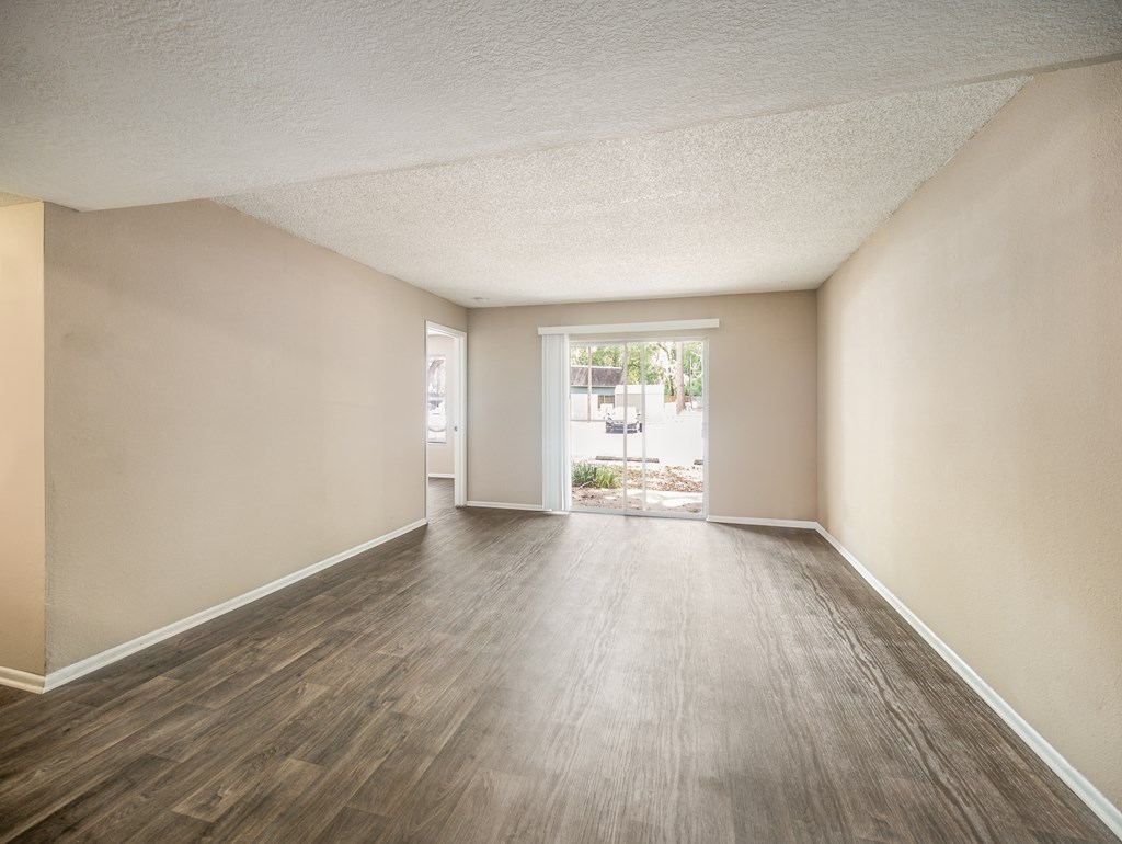 Model Living Room at Reflections Apartment Homes in Gainesville, Florida, FL