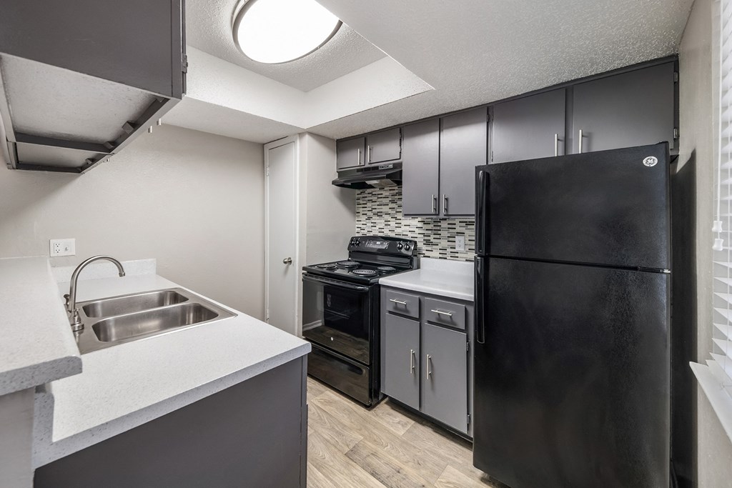 the preserve at ballantyne commons apartment kitchen with stainless steel appliances