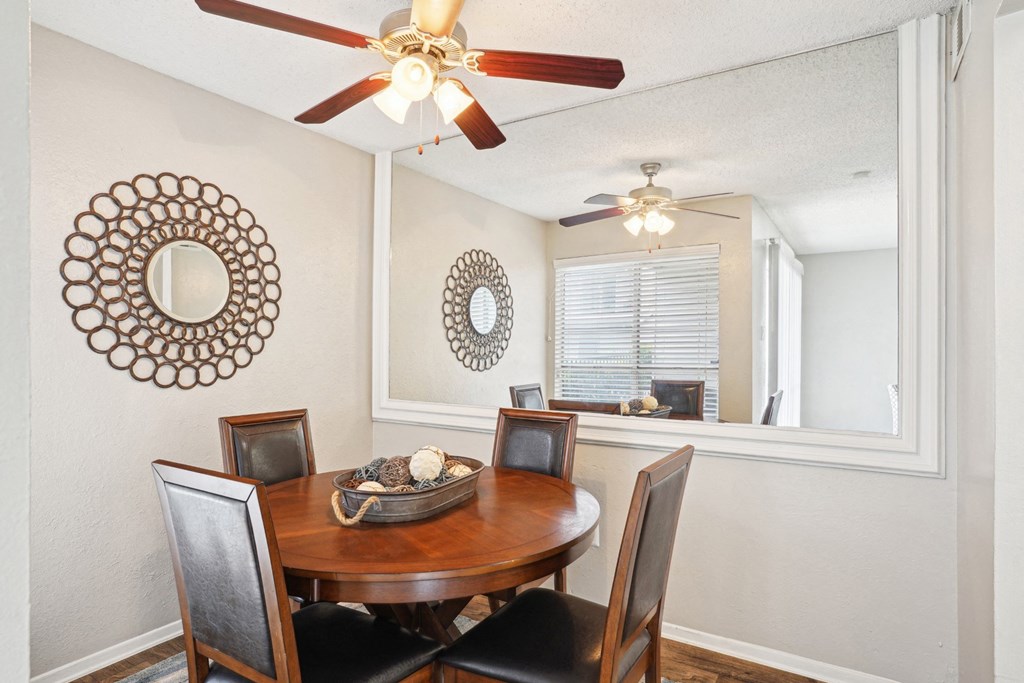 Model A2 floor plan dining room with a table and ceiling fan Noel on The Parkway in Dallas, TX