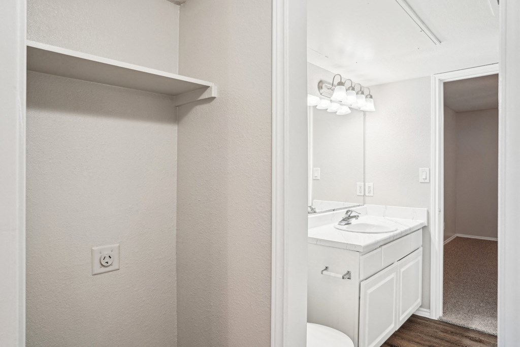 Unfurnished A4 floor plan white bathroom with a sink and a mirror Noel on The Parkway in Dallas, TX