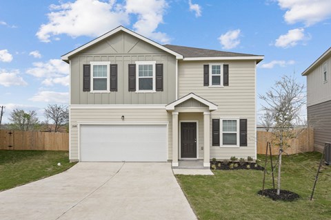 a new home with a large yard at Beacon at Presidential Heights, Manor, TX 78653