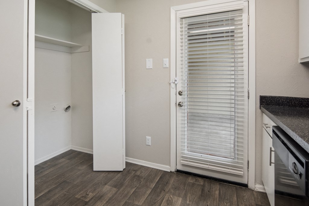 Laundry Closet in Kitchen at Preston Villas Apartment Homes, Dallas, Texas, TX