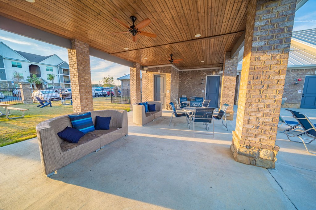 Shaded Outdoor Area by Pool at Parkside Grand Apartments in Pensacola, FL