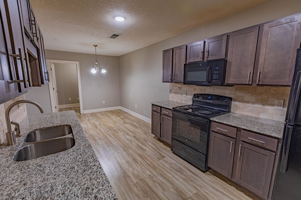 Kitchen Area at Parkside Grand Apartments in Pensacola, FL