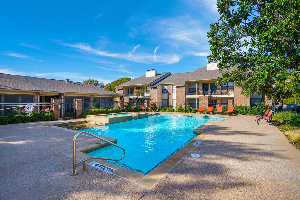 the preserve at ballantyne commons pool area with apartment buildings