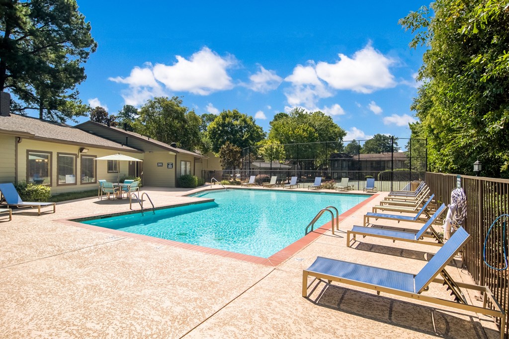 the preserve at ballantyne commons pool with lounge chairs and trees