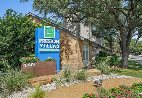 Property sign at Preston Villas in Dallas, TX