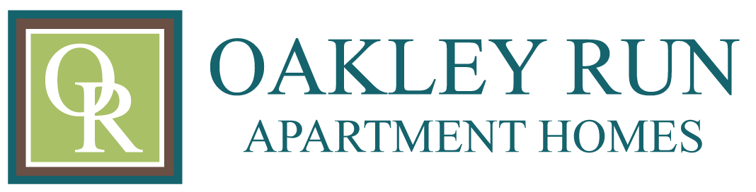 Oakley Run Apartment Homes logo with a green background.