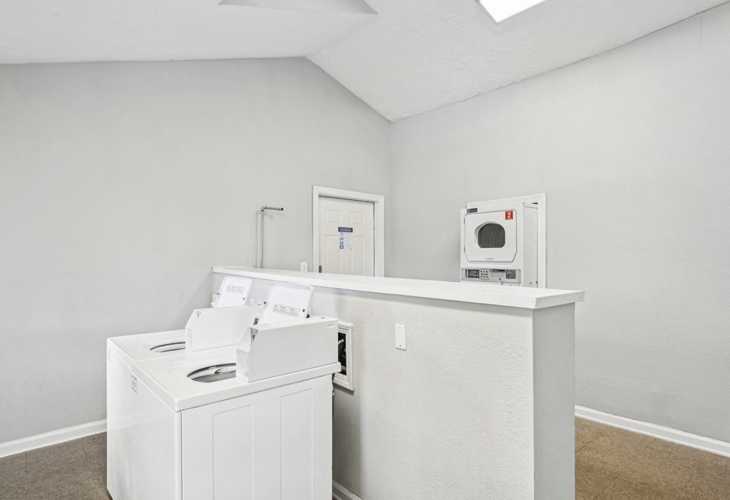 Convenient and efficient laundry area at Pine Village North in Smyrna, GA
