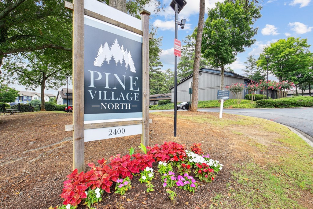 Prominent and welcoming signage at Pine Village North in Smyrna, GA