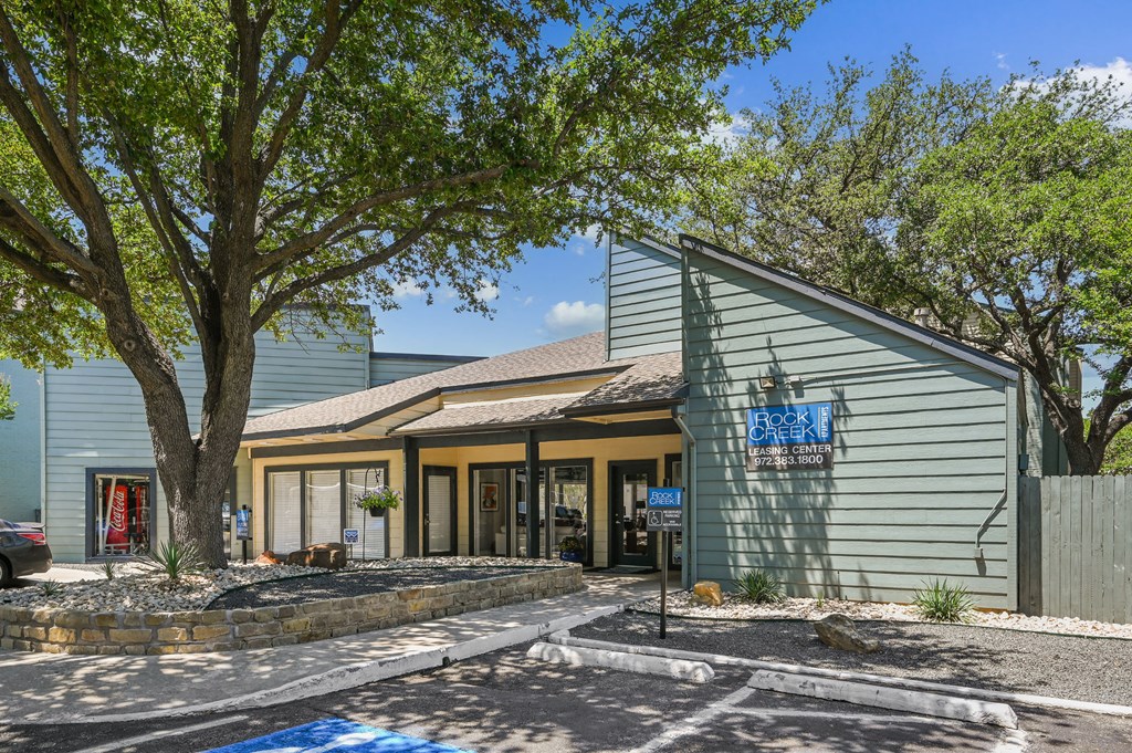 a building with a tree in front of it