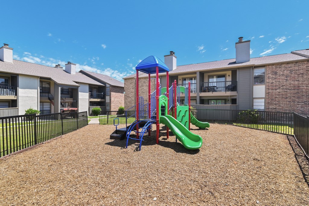 playground at the whispering winds apartments in pearland, tx
