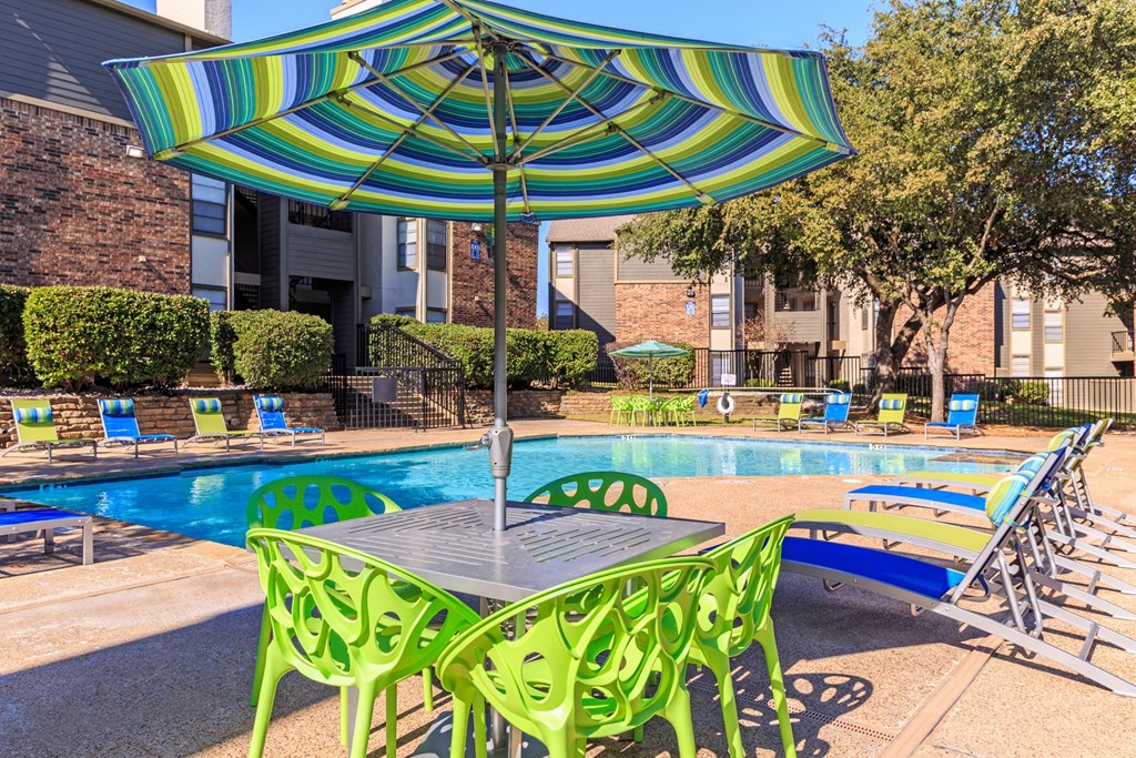 Outdoor table area  at The Summit Apartments in Mesquite, Texas, TX
