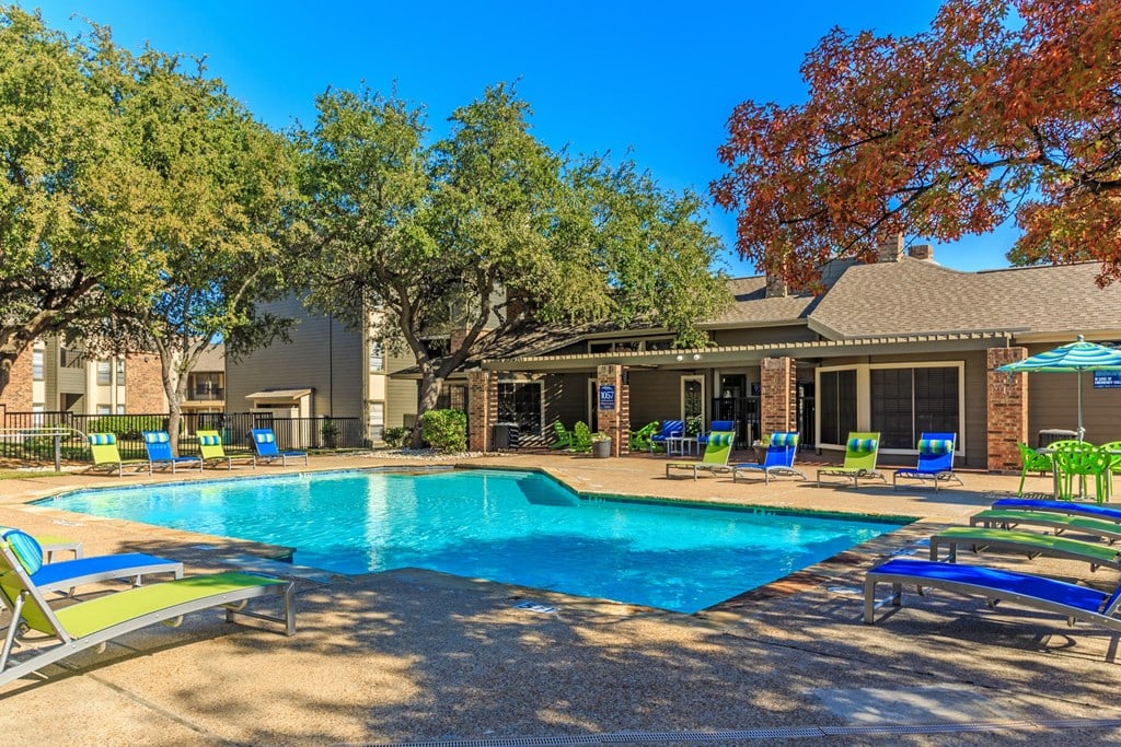 Outdoor swimming pool  at The Summit Apartments in Mesquite, Texas, TX