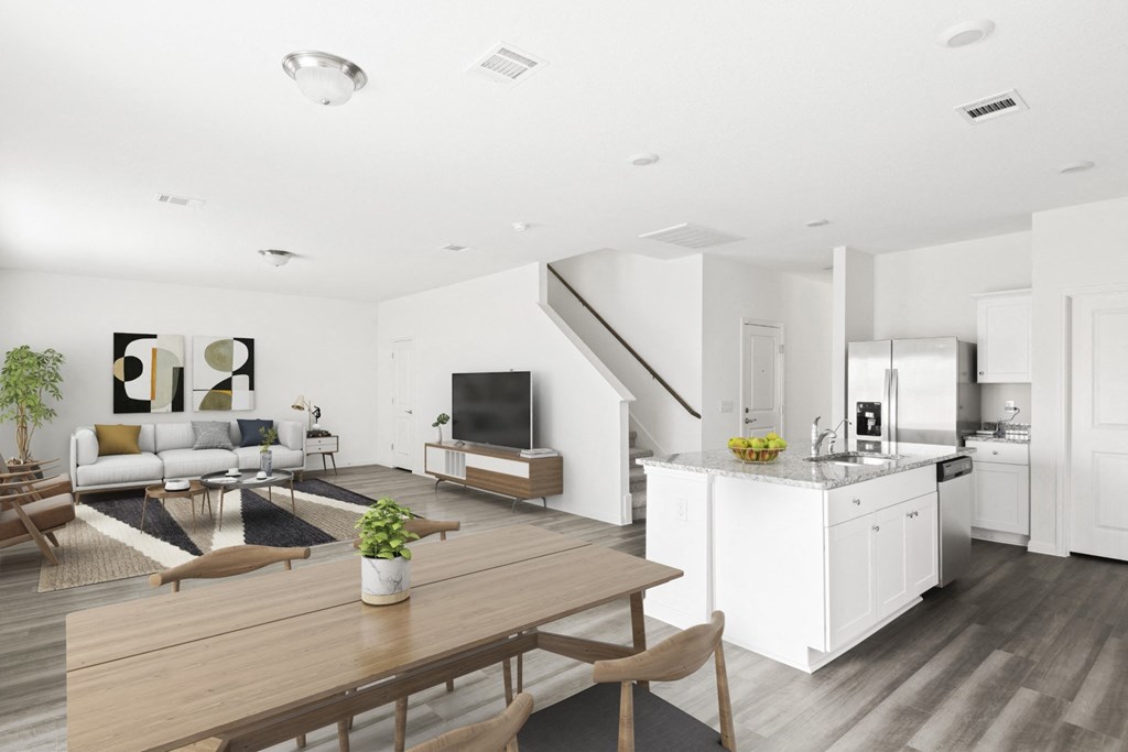 Sycamore furnished showcase of living area and kitchen