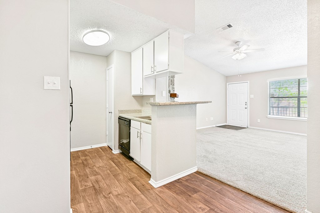 Terrace Unit Kitchen and Dining Room at Bookstone and Terrace Apartments in Irving, Texas