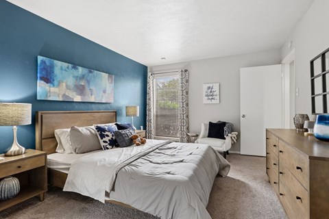 Model unit bedroom at The Summit in Mesquite, TX