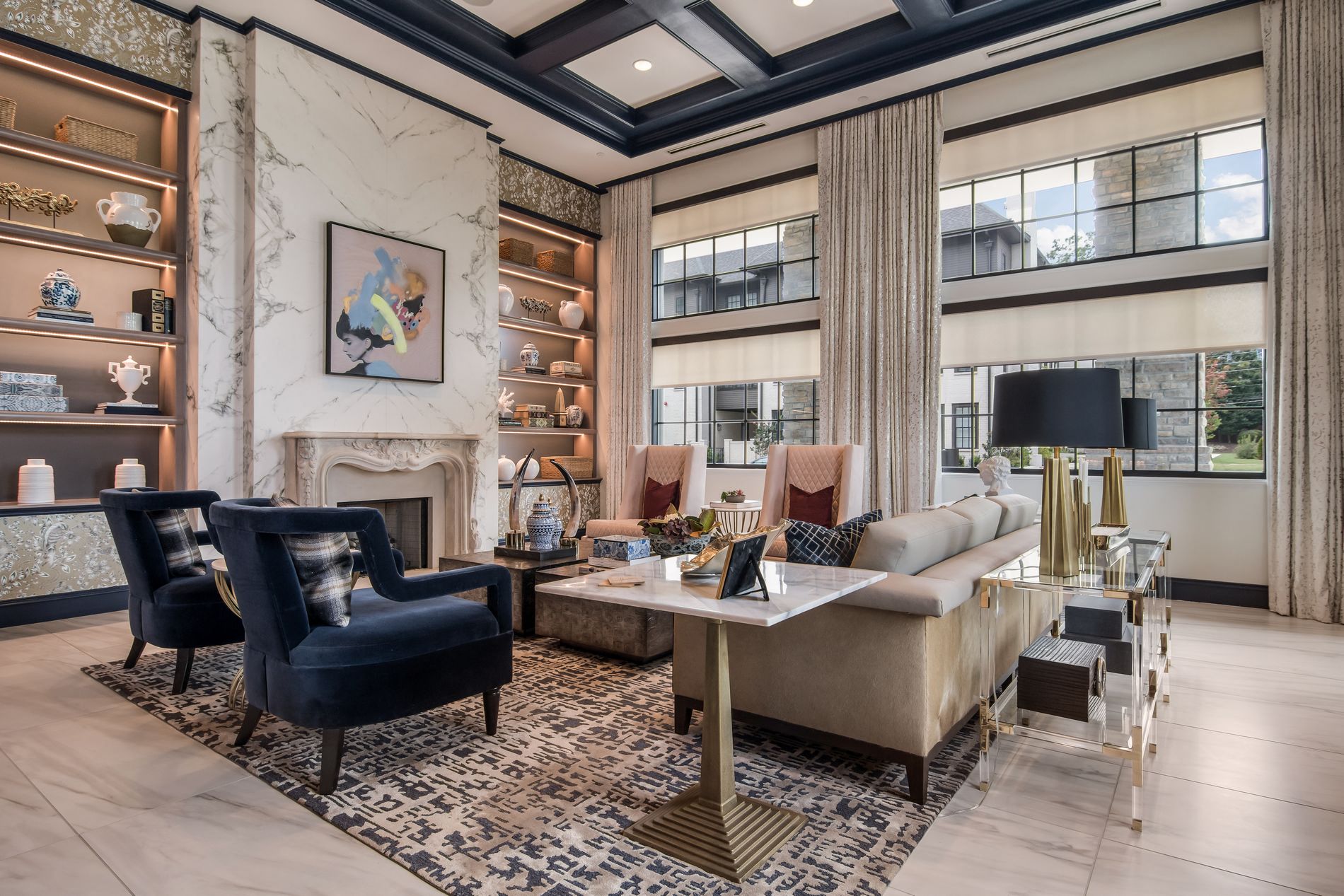 a living room with couches and chairs and a fireplace