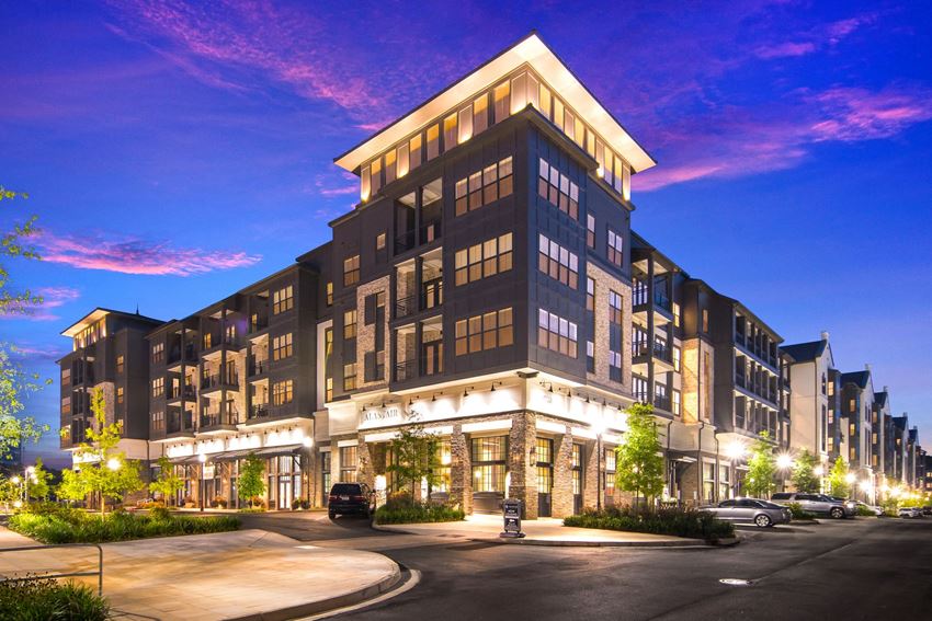 Leasing Office Exterior at Night at The Alastair at Aria Village Apartment Homes in Sandy Springs, Georgia, GA - Photo Gallery 1