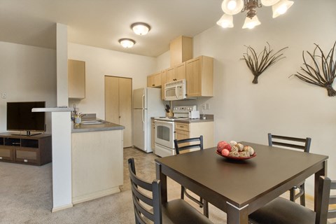 Model Kitchen and Dining Room at The Madison Apartments in Olympia, Washington, WA, 98513
