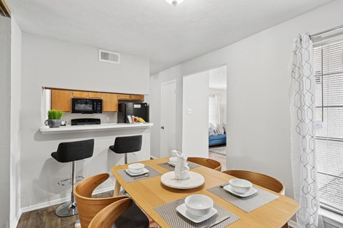 Model unit dining room at The Summit in Mesquite, TX