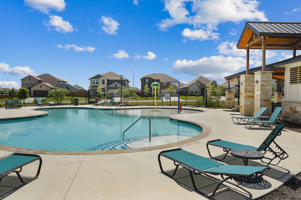 take a dip in the resort style pool at villas at houston levee west apartments at Beacon at Vine Creek, Pflugerville, 78660