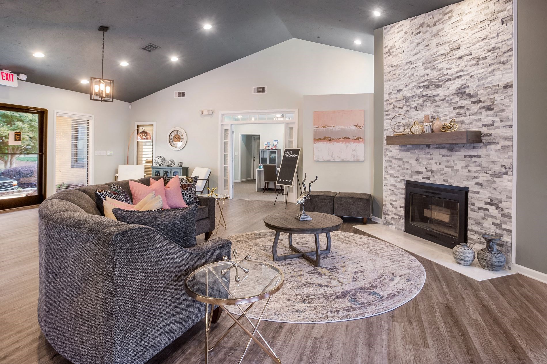 a living room with a couch and a fireplace