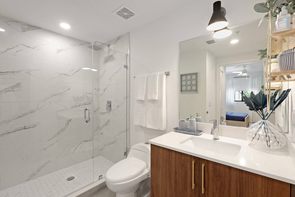 Bathroom with walk-in shower in A2 Floor Plan at Westgate on University in Lauderhill, FL