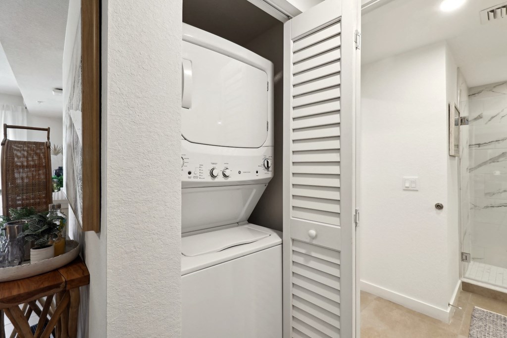 In-unit stacked washer and dryer in A2 Floor Plan at Westgate on University in Lauderhill, FL