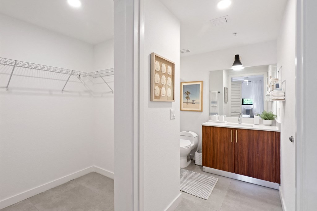 Bathroom entryway in B1 Floor Plan with walk-in closet at Westgate on University in Lauderhill, FL