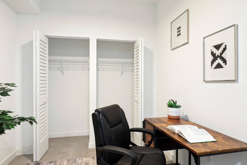 Study with desk and small closet in A2 Floor Plan at Westgate on University in Lauderhill, FL
