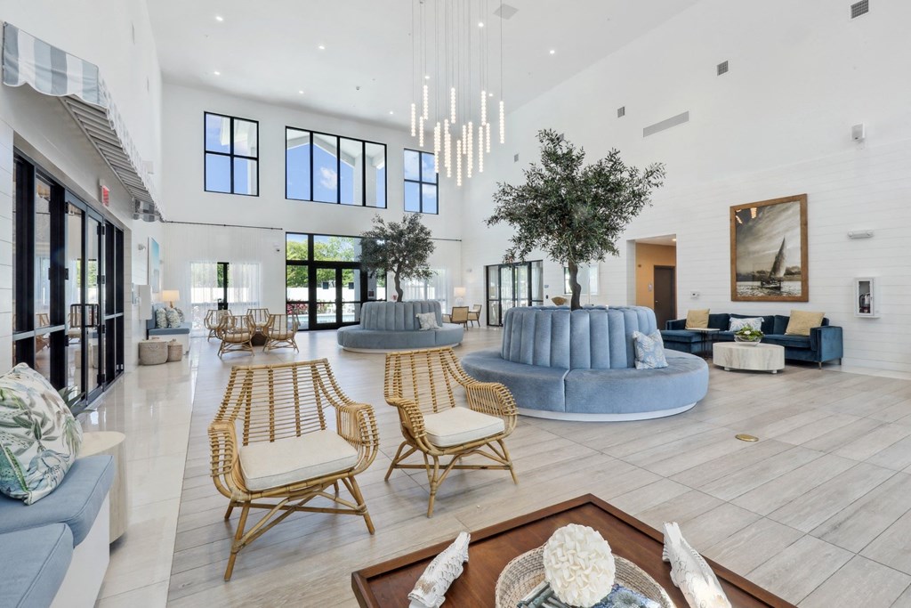 Clubhouse with beautiful trees and seating at Westgate on University in Lauderhill, FL